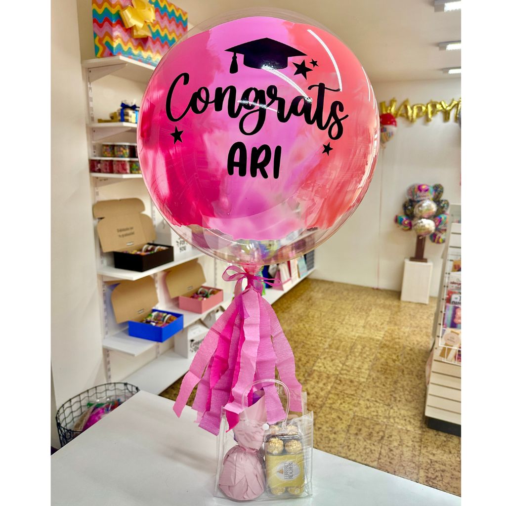 Globo burbuja personalizado de graduación con dulces. Servicio a domicilio en Monterrey. 